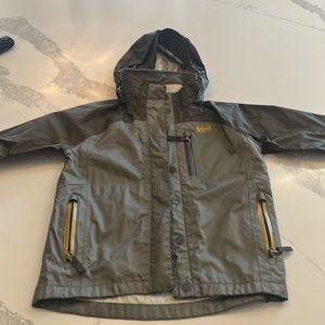 REI Raincoat. Used but great condition. Size XXS (4-5).